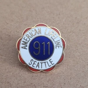 AMERICAN LIFELINE SEATTLE WASHINGTON 911 COPS R US ENAMEL BADGE - Picture 1 of 2