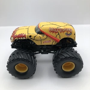Hot Wheels Wildthang Monster Jam Truck scala 1/64 - Foto 1 di 8