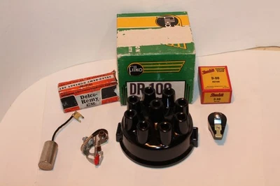 1937-1950 OLDSMOBILE 8 BRASS CAP,ROTOR, POINTS,CONDENSER USA MADE NORS TUNE UP - Image 1 of 4
