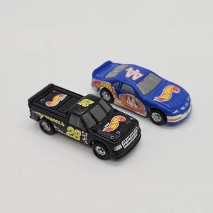 Hot Wheels Planet Micro #44 blau Rennwagen und Stock Truck - Bild 1 von 5