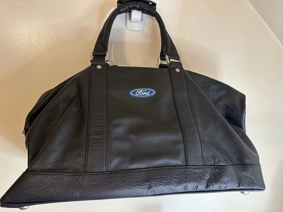 Bolsa de viaje Ford negra como cuero nunca usada excelente estado grande Foto 1 de 4