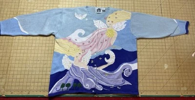 Libro de Cuentos Tejidos Sol Celestial Luna Suéter Ángeles 2X Foto 1 de 4