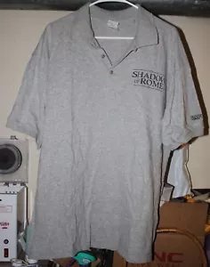 Vintage Shadow Of Rome Poloshirt Gr. XL Werbeshirt Capcom Gildan - Bild 1 von 5