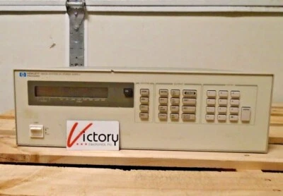 Used Hewlett Packard HP 6623A System DC Power Supply | 3 Outputs / 80W 50V 0.8A  - Image 1 of 4