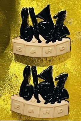 Pendientes hipoalergénicos instrumento de banda Foto 1 de 2