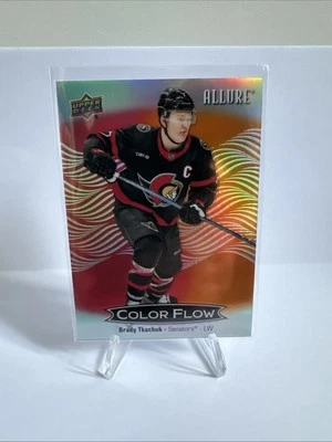 2024-25 Upper Deck Allure Color Flow Brady Tkachuk #CFL-10 Red Orange - Image 1 of 2