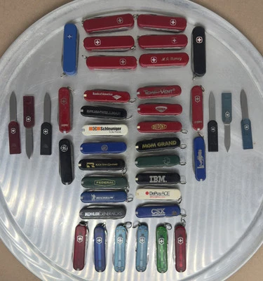 40 件老式 Victorinox & Wenger 瑞士军刀套装 2 件 Hoffritz 6 半透明 — 第 1/2 张图片