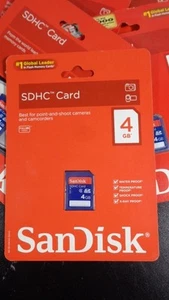 SANDISK SDHC CARD 4GB CLASS 4 ~ NEW IN FACTORY SEALED PACKAGE - Photo 1 sur 2