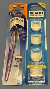 Palo de hilo dental Reach Access Johnson púrpura con 28 hilo dental extra sin sabor - Imagen 1 de 3