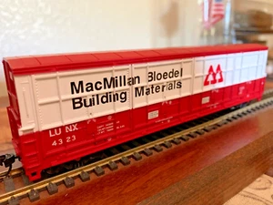 MacMILLAN BLOEDEL MATERIALS 60 ft THRALL DOOR CAR - HO SCALE - " "Logo RTR NEW - Picture 1 of 5