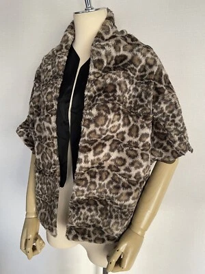 Capa Comme Des Garcons imitación piel estampado leopardo AD2005 Foto 1 de 4