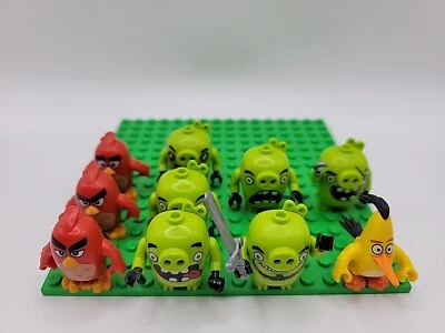 Lego Angry Birds Minifigure Lot of 10 Piggys, Pirates, Yellow, And Red - Image 1 of 4