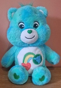 Official Care Bears Love The Earth Soft Toy Plush Blue Green Rainbow & Heart - Picture 1 of 3