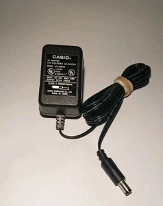 Casio Netzteil Model: AD-A60024 6V 240mA AC für elektronischen Taschenrechner (getestet) - Bild 1 von 3