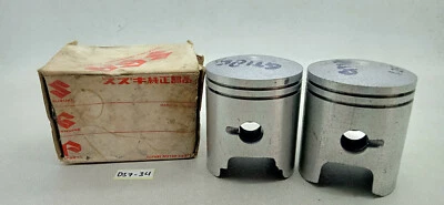 Par de pistones originales Suzuki GT185 GT-185 tamaño 1,25 Foto 1 de 4