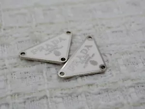 Set of 2 White and Silver Prada metal emblem, triangle metal plate - Picture 1 of 6