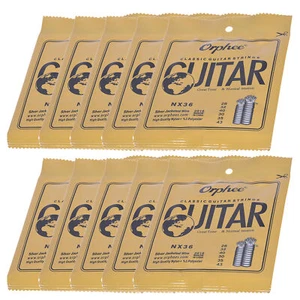 10 juegos de cuerdas de guitarra de nailon (.028-.043) de repuesto para guitarra clásica R1M4 - Imagen 1 de 10