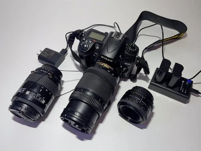 Nikon D7000 DSLR Camera + 3 Lenses (70-300mm, 50mm, 35-105mm) + Dual Charger - Image 1 of 4