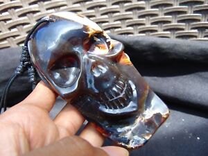 66.05 gr Skull Carving Pendant 115x55x19 mm Indonesian Dark Amber D2 For Healing