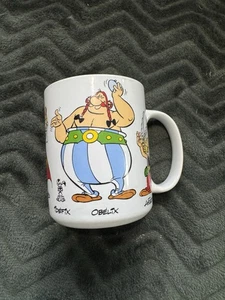 PARC ASTERIX - TAZA DE CAFÉ CON PERSONAJES 2002, NOMBRES FRANCESES - COLECCIONABLE - Imagen 1 de 11
