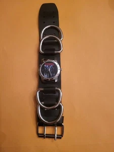 RELOJ PULSERA - TESTAMENTO - CUERO - 4 GRANDES AROS DE ACERO - ANCHO ANCHO 9"L X 1 1/2"W - Imagen 1 de 5
