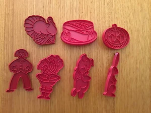 7 Vintage Red Tupperware Cookie Cutters. Man, Pig, Clown, Cake, Pumpkin, Rabbit - Picture 1 of 9