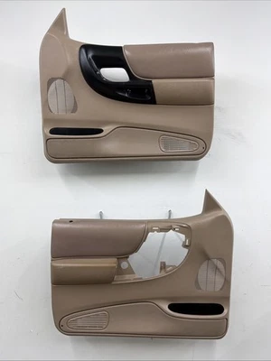 Juego de paneles de puertas eléctricas interiores delanteras Ford Ranger 1995-2001 OEM bronceado Foto 1 de 4