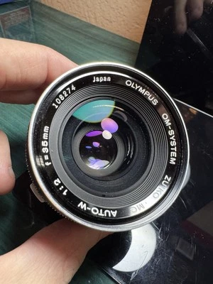 Lente gran angular Olympus Zuiko MC AUTO-W 35 mm f/2,0 Zuiko buen estado Foto 1 de 4