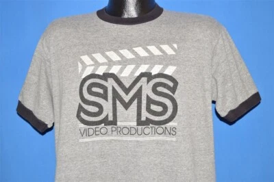 Camiseta vintage años 80 SMS VIDEO PRODUCCIONES GRIS RAYÓN TRI MEZCLA TIMBRE GRANDE L Foto 1 de 4