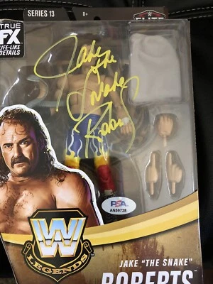 Figura de acción AUTOGRAFIADA Jake "The Snake" Roberts WWE Elite Serie 13 PSA Foto 1 de 2