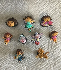 DORA THE EXPLORER JIBBITZ DORA SHOE CHARMS MAP JIBBITZ BOOTS JAGUAR DIEGO CHARMS - Picture 1 of 10