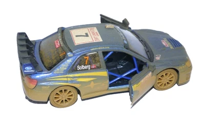 KINSMART 2007 Subaru Impreza WRC 5" largo aspecto fangoso coche de carreras #7 escala 1/36 Foto 1 de 4