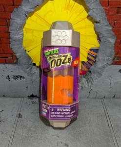 SIGILLATO 2012 Teenage Mutant Ninja Turtles Mutagen Orange Ooze MISP con personaggio TMNT - Foto 1 di 1