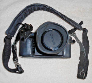 Canon T70 35mm Camera, with 50mm and 52mm Skylight (1A) Lens - Picture 1 of 3