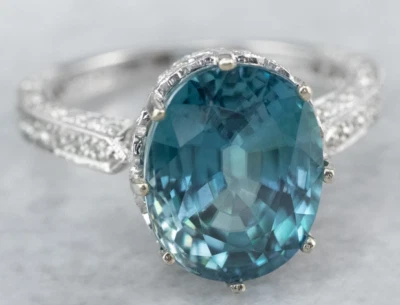 Anillo de cóctel para mujer con topacio azul y circonitas cúbicas en plata de ley 925  Foto 1 de 4