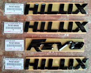 GENUINE TOYOTA HILUX REVO 2015-22 PLATE BACK FRONT DOOR L/R SUBNAME MARK BLACK - Picture 1 of 7