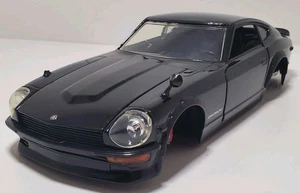 Jada 1/24 1972 Datsun 250z Teileträger - Bild 1 von 11