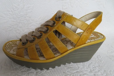 FLY LONDON YITO MUSTARD YELLOW LACE UP WEDGE SANDALS, SZ 37 - Image 1 of 4