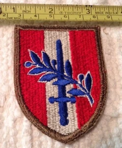 US FORCES AUSTRIA OCCUPATION HG (2nd DESIGN) PATCH -1945 TO 1956 - Picture 1 of 3