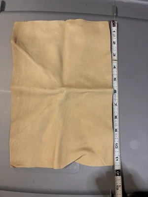 Chatarra de cuero tostado suave genuino  Foto 1 de 3