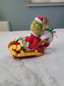 Der Grinch Santa Grinch animierter beweglicher Plüschschlitten spielt Grinchlied Weihnachten - Bild 1 von 9