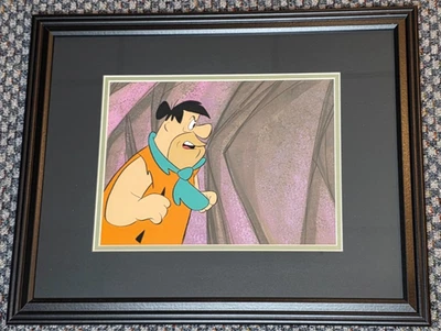 1970s FLINTSTONES PRODUCTION CEL OF FRED ON A HAND PAINTED PRODUCTION BACKGROUND - Image 1 of 2