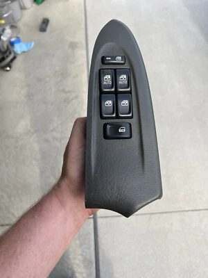 02-05 GMC ENVIY DRIVER L. INTERRUPTOR DE VENTANA ELÉCTRICA MAESTRO LATERAL 15204659 Gris Oscuro Foto 1 de 4