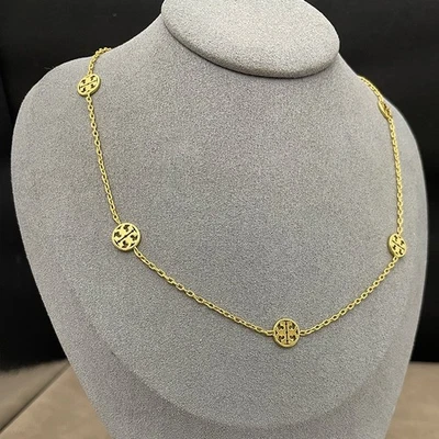 ¡Nuevo! Collar con logotipo de cadena Tory DORADO con bolsa de joyería Tamaño: 45,5 cm Foto 1 de 2