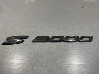 00-09 Honda S2000 Ap1 Ap2 emblema guardabarros OEM Foto 1 de 4