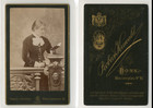 Krewald, Bonn, young girl in full reading, circa 1885 vintage albumen car CDV
