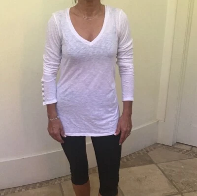 Top de terciopelo Calypso St Barth para mujer blanco liso cuello en V manga larga tejido algodón  Foto 1 de 4