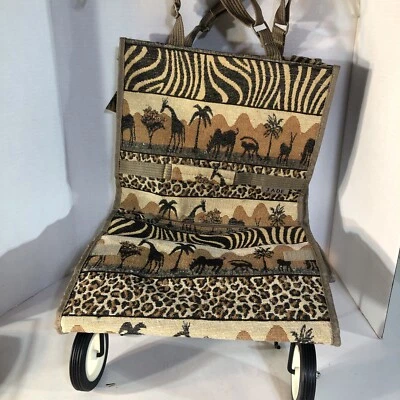 Rolling Luggage By Jade Expands To 23” Compresses To 13.5”x 7.5”. African Safari - Image 1 of 4