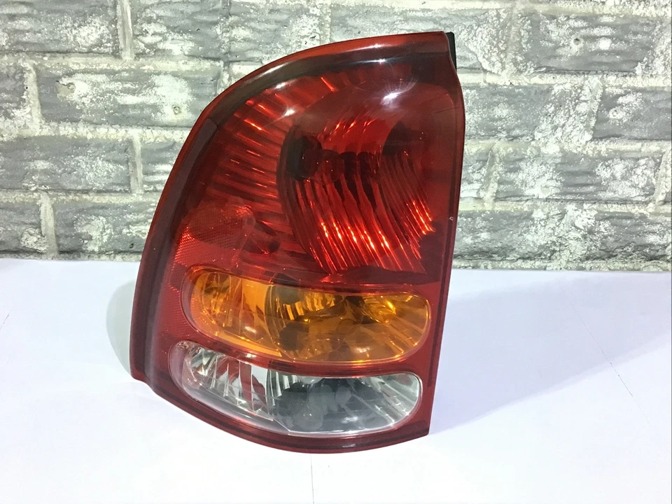 Luz trasera izquierda Oldsmobile Bravada 2002-2004 (lado del conductor) COMPLETA, OEM Foto 1 de 4