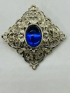 Broche prendedor estilo patrimonio vintage tono dorado filigrana piedra azul cobalto 1928? - Imagen 1 de 4